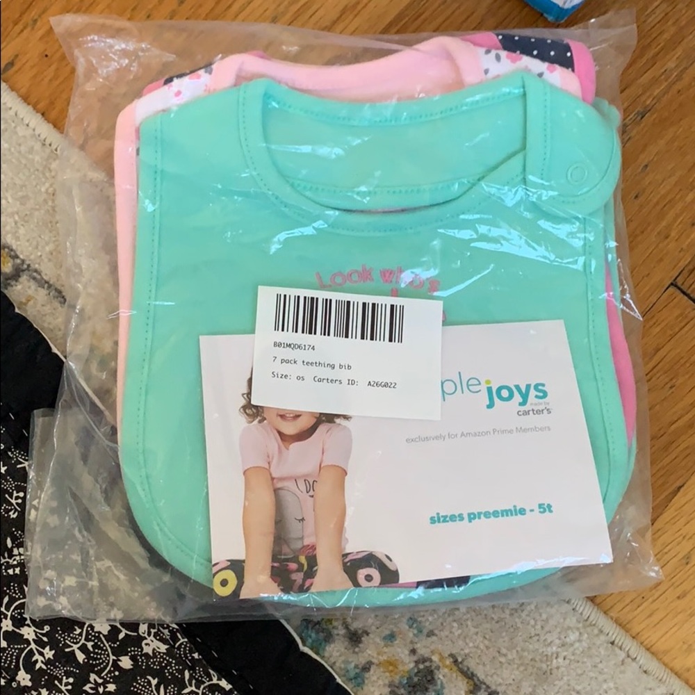 7 pack of carters teething bibs